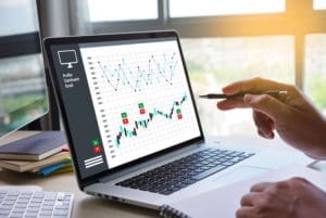 Forecasting charts on a laptop